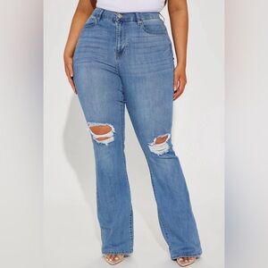 Fashion Nova Women's Jessie Mid Rise Distressed Bootcut Jean in Light Blue Wash